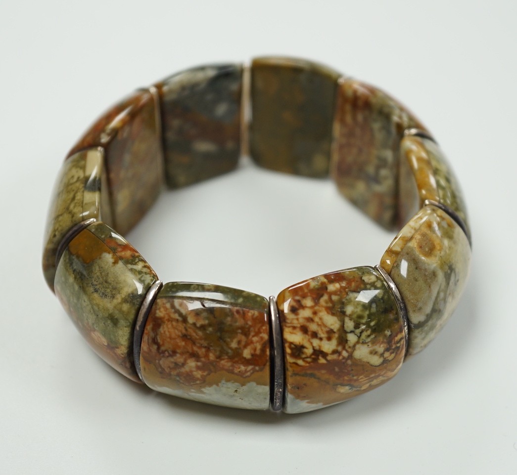 An early 20th century white metal and Scottish hardstone set flexible bracelet, with box.